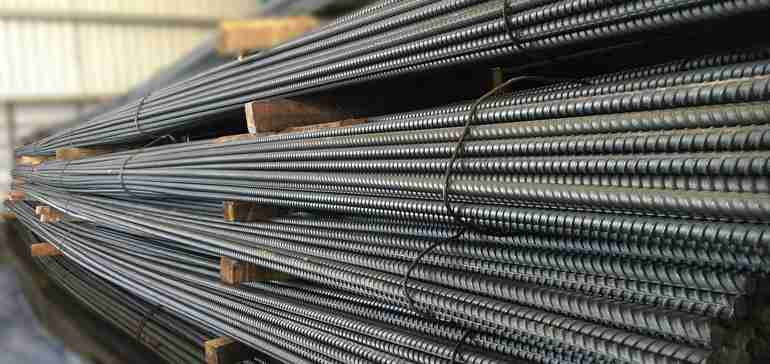 Skyrocketing steel, lumber costs threaten to slow construction jobs